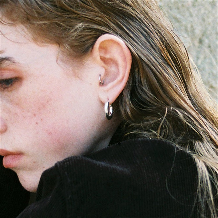 interpose earrings
