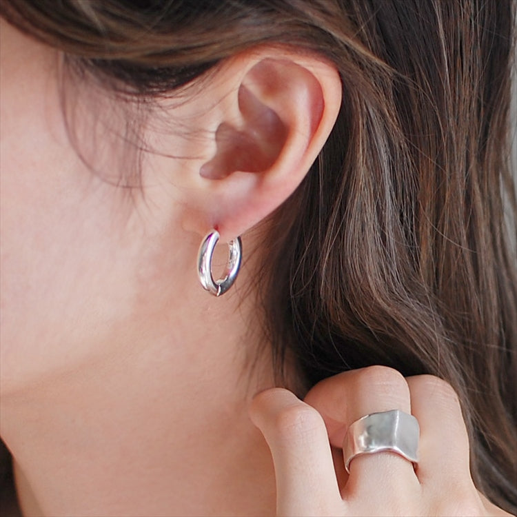 interpose earrings