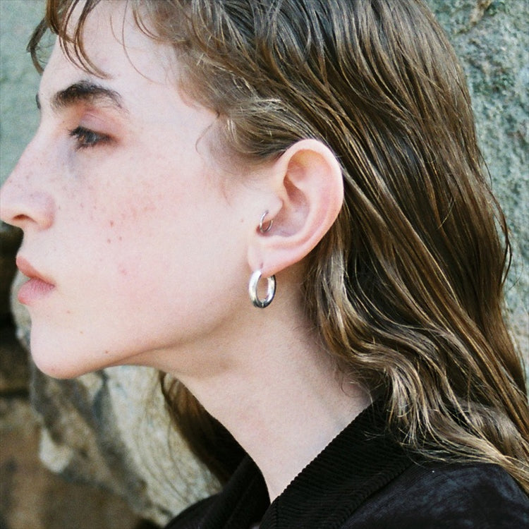 interpose earrings