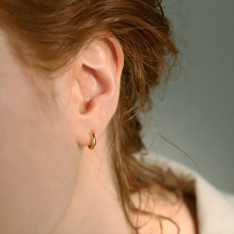 K18 orbit earrings