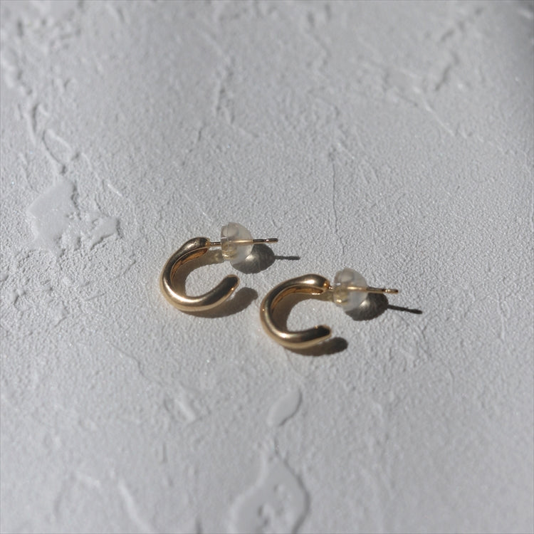 K18 orbit earrings