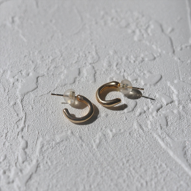 K18 orbit earrings