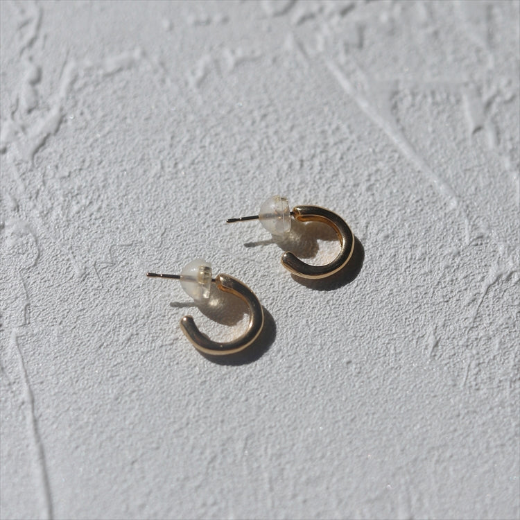 K18 orbit earrings